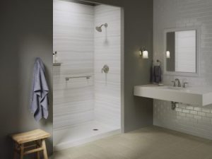 Modern bathroom with grey walls and a white walk-in shower