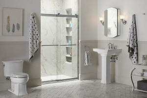 Large white bathroom with modern fixtures and a walk-in shower