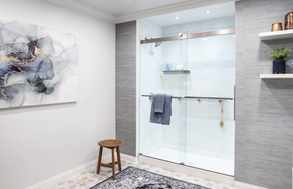 Sleek bathroom after a tub-to-shower remodel.